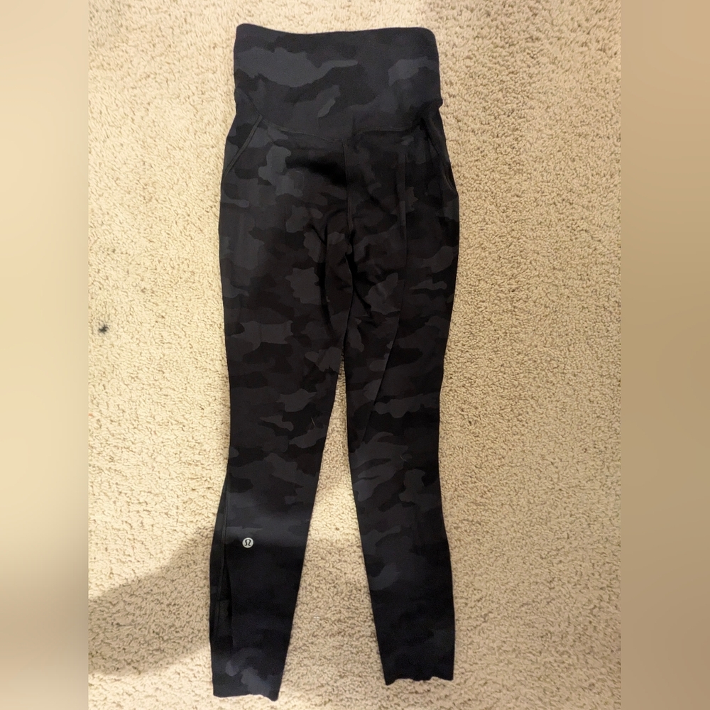 Lululemon leggings, women's size 2, and color is camo.